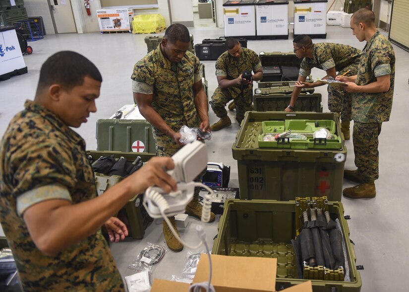 U.S. Marine Corps and U.S. Navy personnel from the Combat Logistics Battalion 451 Detachment 3, work together to conduct inventory checks on equipment at Joint Base Charleston - Weapons Station, S.C., June 21, 2017. In addition to preparing medical logistics, the unit trains to perform military honors at funerals for any members who have honorably served in the U.S. Marine Corps within a 200-mile radius of the base. 