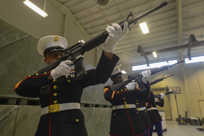 U.S. Marine Corps members from the Combat Logistics Battalion 451 Detachment 3 practice their formation and rifle skills during an Honor Guard training session at Joint Base Charleston - Weapons Station, S.C., June 21, 2017. The unit performs primarily funeral honors, but they will occasionally do color performances as well. 