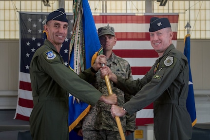 U.S. Air Force Col. Jason Hinds (right), 1st Fighter Wing commander, assumes command of the 1st FW during a change of command ceremony at Joint Base Langley-Eustis, Va., June 23, 2017. Hinds is a command pilot with more than 2,100 flying hours earned primarily in the F-22 Raptor and F-15C Eagle aircraft. (U.S. Air Force photo by Senior Airman Derek Seifert)