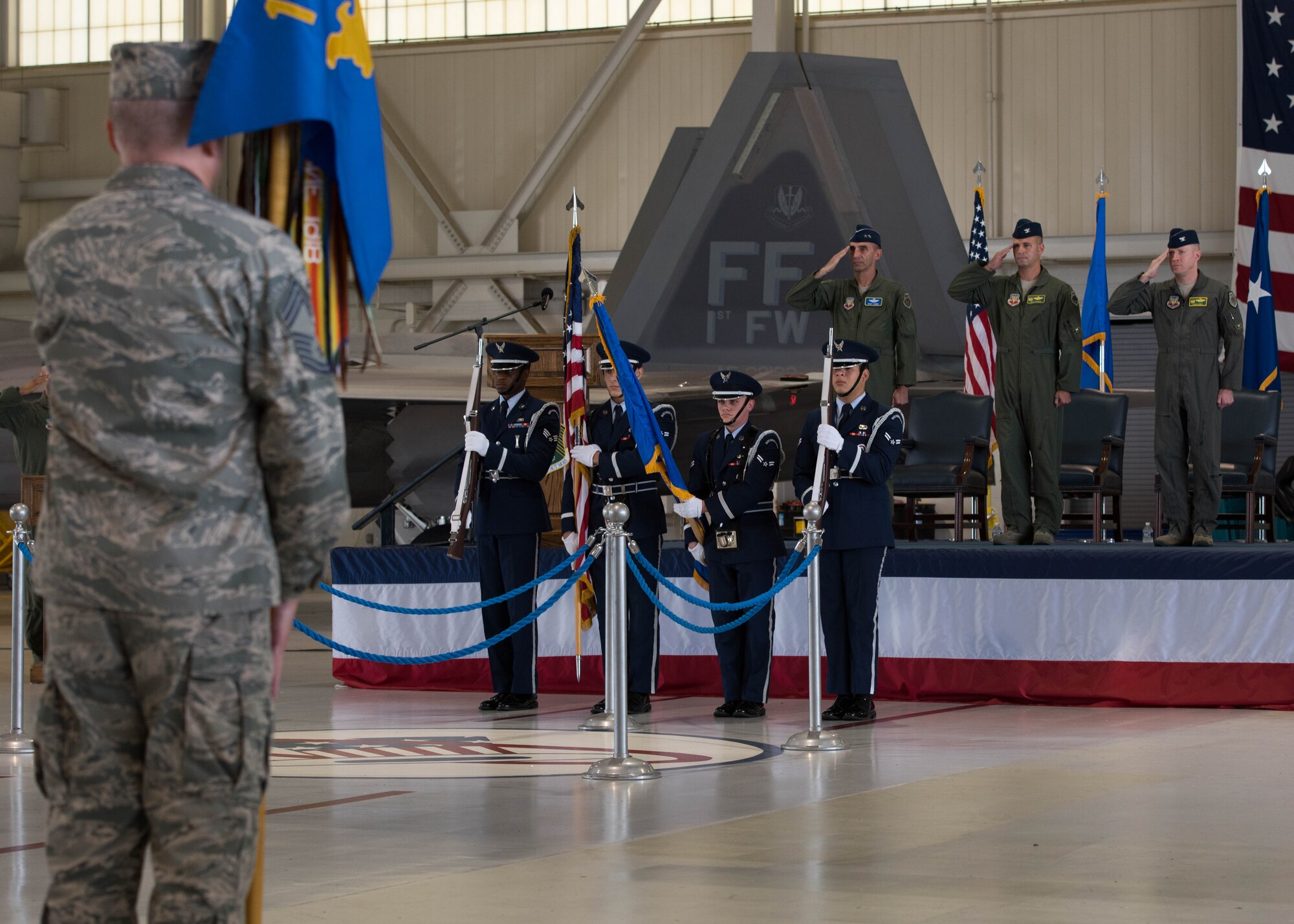 Langley Air Force Base Honor Guard members present the colors during the 1st Fighter Wing change of command ceremony at Joint Base Langley-Eustis, Va., June 23, 2017. U.S. Air Force Col. Peter Fesler relinquished command to U.S. Air Force Col. Jason Hinds after two years of service. (U.S. Air Force photo/Staff Sgt. J.D. Strong II) 