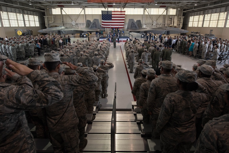 Airmen attend the 1st Fighter Wing change of command, where U.S. Air Force Col. Peter Fesler relinquished command of the 1st FW to U.S. Air Foce Col. Jason Hinds, Joint Base Langley-Eustis, June 23, 2017. The 1st FW has a 100 year heritage that stretches back to World War I. (U.S. Air Force photo by Staff Sgt. Carlin Leslie)