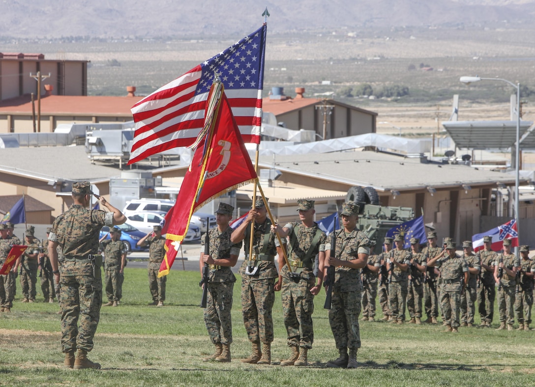 The 3rd Light Armored Reconnaissance Battalion Color Guard presents the colors during the 3rd LAR change of command ceremony at Lance Cpl. Torrey L. Gray Field aboard Marine Corps Air Ground Combat Center Calif., June 15. During the ceremony, Lt. Col. Philip C. Laing, outgoing commanding officer, 3rd LAR, relinquished command to Lt. Col. Rafael A. Candelario II, oncoming commanding officer, 3rd LAR.