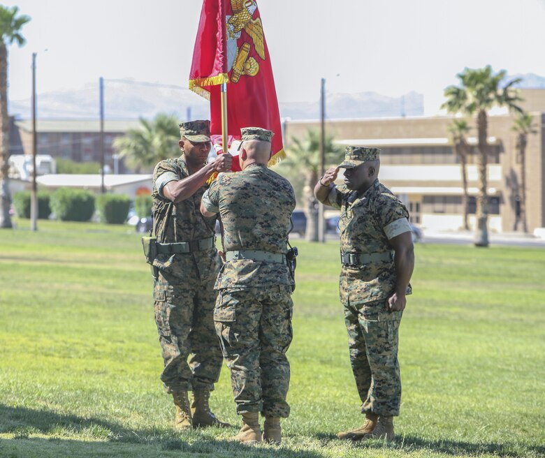 Lt. Col. Philip C. Laing, outgoing commanding officer, 3rd Light Armored Reconnaissance Battalion, relinquished command to Lt. Col. Rafael A. Candelario II, oncoming commanding officer, 3rd LAR, by handing of the battalion colors during the 3rd LAR change of command ceremony at Lance Cpl. Torrey L. Gray Field aboard Marine Corps Air Ground Combat Center Calif., June 15.