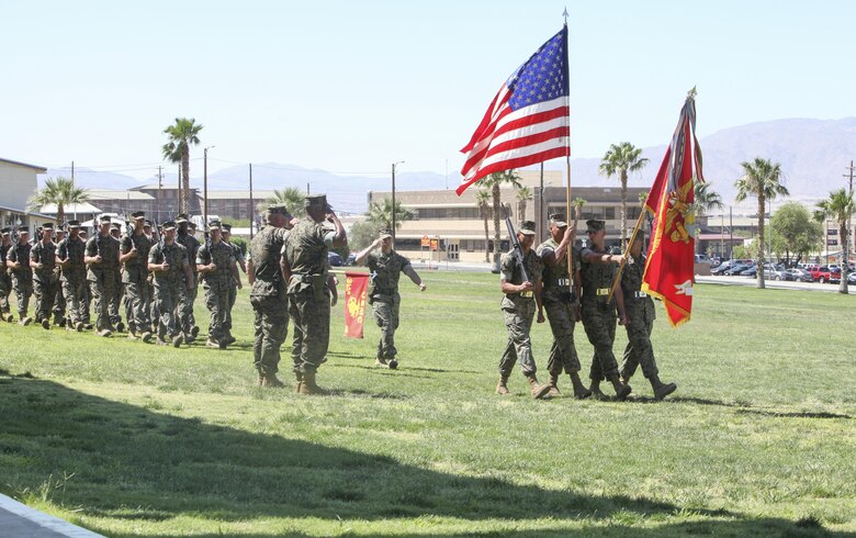 The 3rd Light Armored Reconnaissance Battalion Color Guard presents the colors during the 3rd LAR change of command ceremony at Lance Cpl. Torrey L. Gray Field aboard Marine Corps Air Ground Combat Center Calif., June 15. During the ceremony, Lt. Col. Philip C. Laing, outgoing commanding officer, 3rd LAR, relinquished command to Lt. Col. Rafael A. Candelario II, oncoming commanding officer, 3rd LAR.