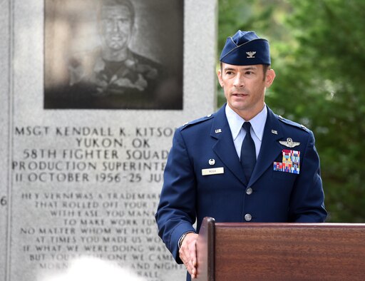 U.S. Air Force Col. Paul Moga, 33rd Fighter Wing commander, speaks to the audience during the Khobar Towers 21st Anniversary Wreath Laying Ceremony June 23, 2017, at Eglin Air Force Base, Florida. On June 25, 1996, a bomb was detonated near the Khobar Towers housing complex in Dhahran, Saudi Arabia. Nineteen Airmen were killed and more than 400 U.S. and international military and civilians were injured in the blast.  Of the 19 killed, 12 were Nomads. Each year the 33 FW holds a ceremony in remembrance of that day. (U.S. Air Force photo by Staff Sgt. Peter Thompson)