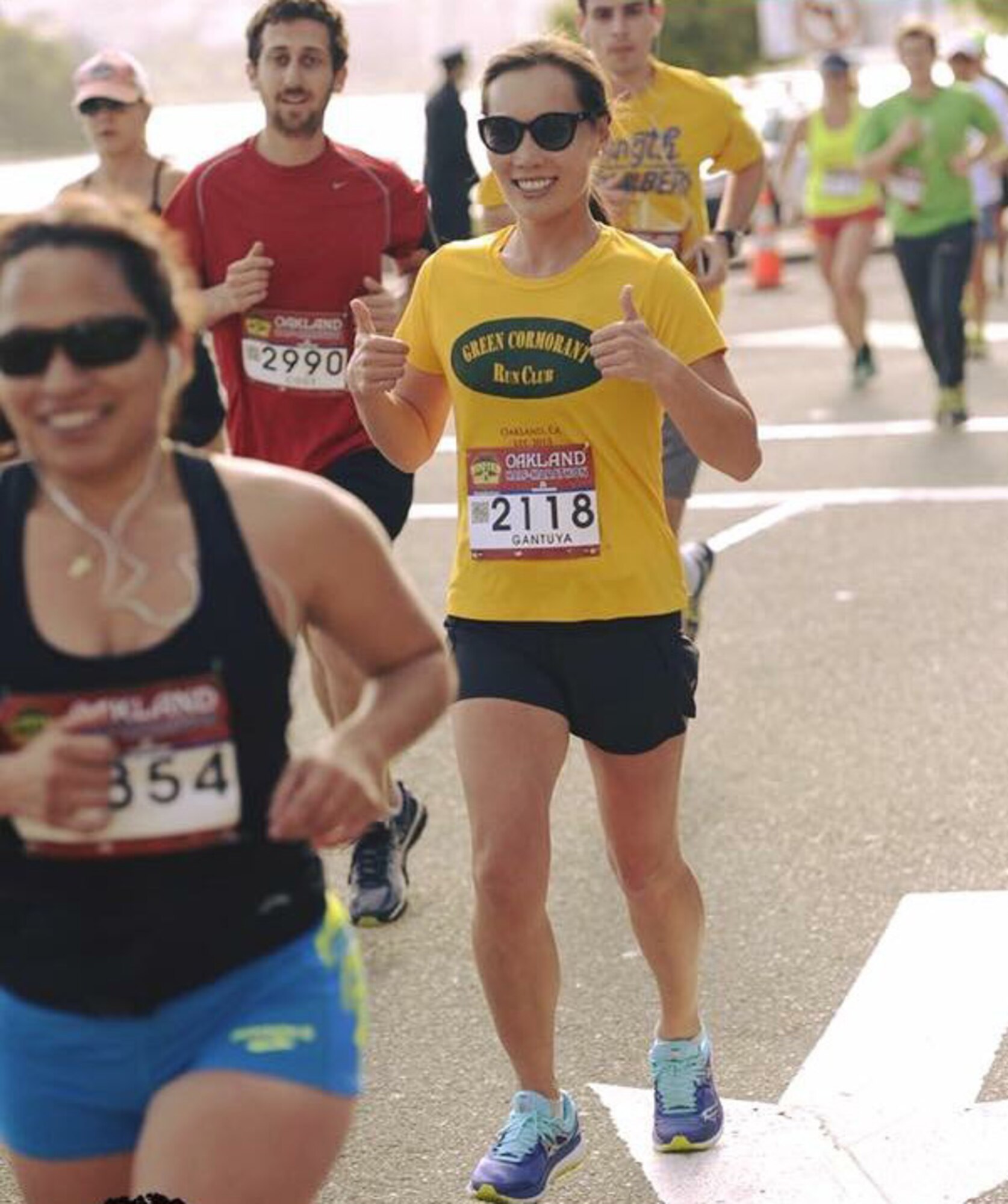 U.S. Air Force Airman 1st Class Gantuya Larkins, an individual protective equipment technician assigned to the 6th Logistics Readiness Squadron at MacDill Air Force Base Fla., gives thumbs up during a run. Larkins is training to participate in the U.S. Air Force Marathon in September 2017. (Courtesy Photo) 