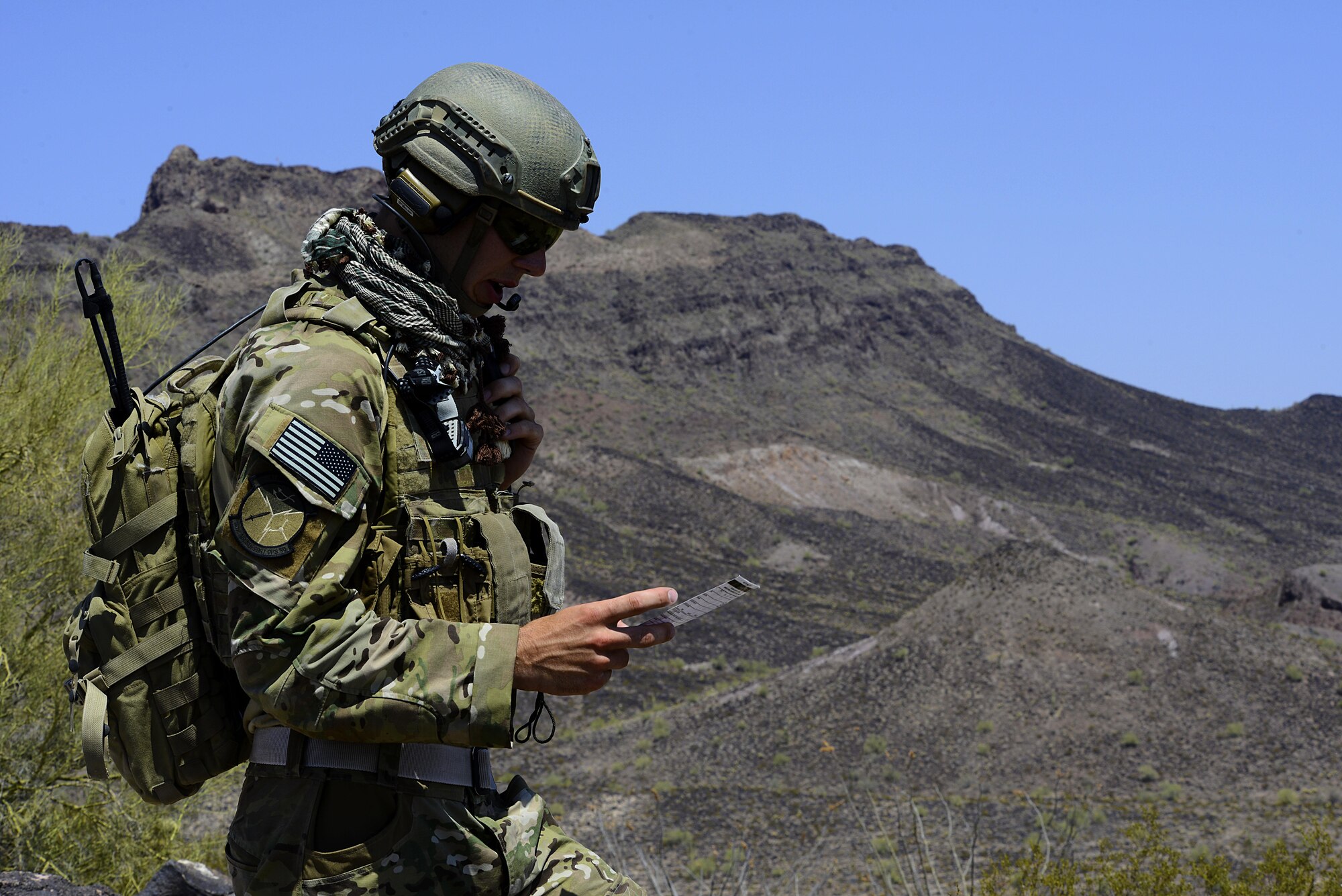 Airman 1st Class Benjamin Leavitt, 10th Air Support Operations Squadron tactical air control party apprentice, calls in close air support from an Italian F-35 during a training mission, June 22, 2017, at Barry M. Goldwater Range, Ariz. The training mission provided Leavitt exposure to new training areas and an opportunity to work with foreign pilots. (U.S. Air Force photo/Staff Sgt. Trevor Rhynes) 