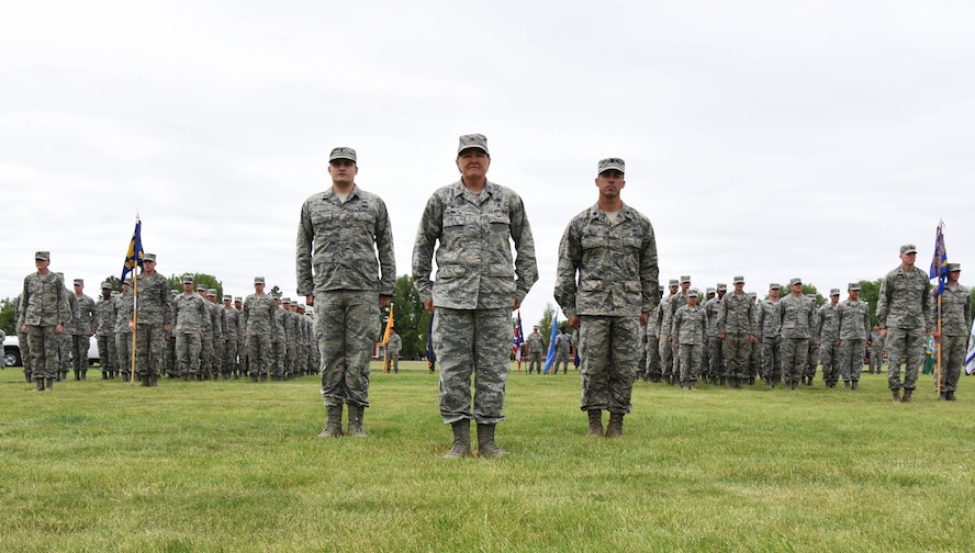 Airmen with the 90th Mission Support Group stand in formation on the parade field during the 90th Missile Wing change of command ceremony at F.E. Warren Air Force Base, Wyo., June 23, 2017. Col. Stacy Huser assumed command of the wing from Col. Stephen Kravitsky during the ceremony. (U.S. Air Force photo by Airman 1st Class Breanna Carter)