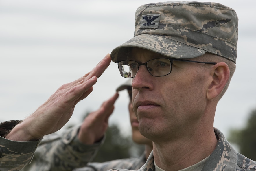 Colonel Greg Buckner, 90th Maintenance Group commander, renders a salute during the 90th Missile Wing change of command ceremony on the Argonne Parade Field at F.E. Warren Air Force Base, Wyo., June 23, 2017. The 90th MXG provides world-class maintenance for the 90th MW’s 150 Minuteman III ICBM’s and their launch facilities as well as 15 missile alert facilities and associated equipment. The change of command ceremony signified the transition of command from Col. Stephen Kravitsky to Col. Stacy Huser. (U.S. Air Force photo by Staff Sgt. Christopher Ruano)