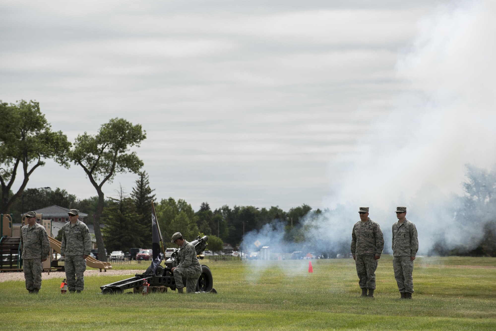 Conventional ammunition Airmen from the 90th Munitions Squadron operate a cannon during the 90th Missile Wing change of command ceremony on the Argonne Parade Field at F.E. Warren Air Force Base, Wyo., June 23, 2017. The cannon sounded as Maj. Gen. Anthony Cotton, 20th Air Force commander, passed the 90th MW guidon to the incoming commander, Col. Stacy Huser. The change of command ceremony signified the transition of command from Col. Stephen Kravitsky to Huser. (U.S. Air Force photo by Staff Sgt. Christopher Ruano)