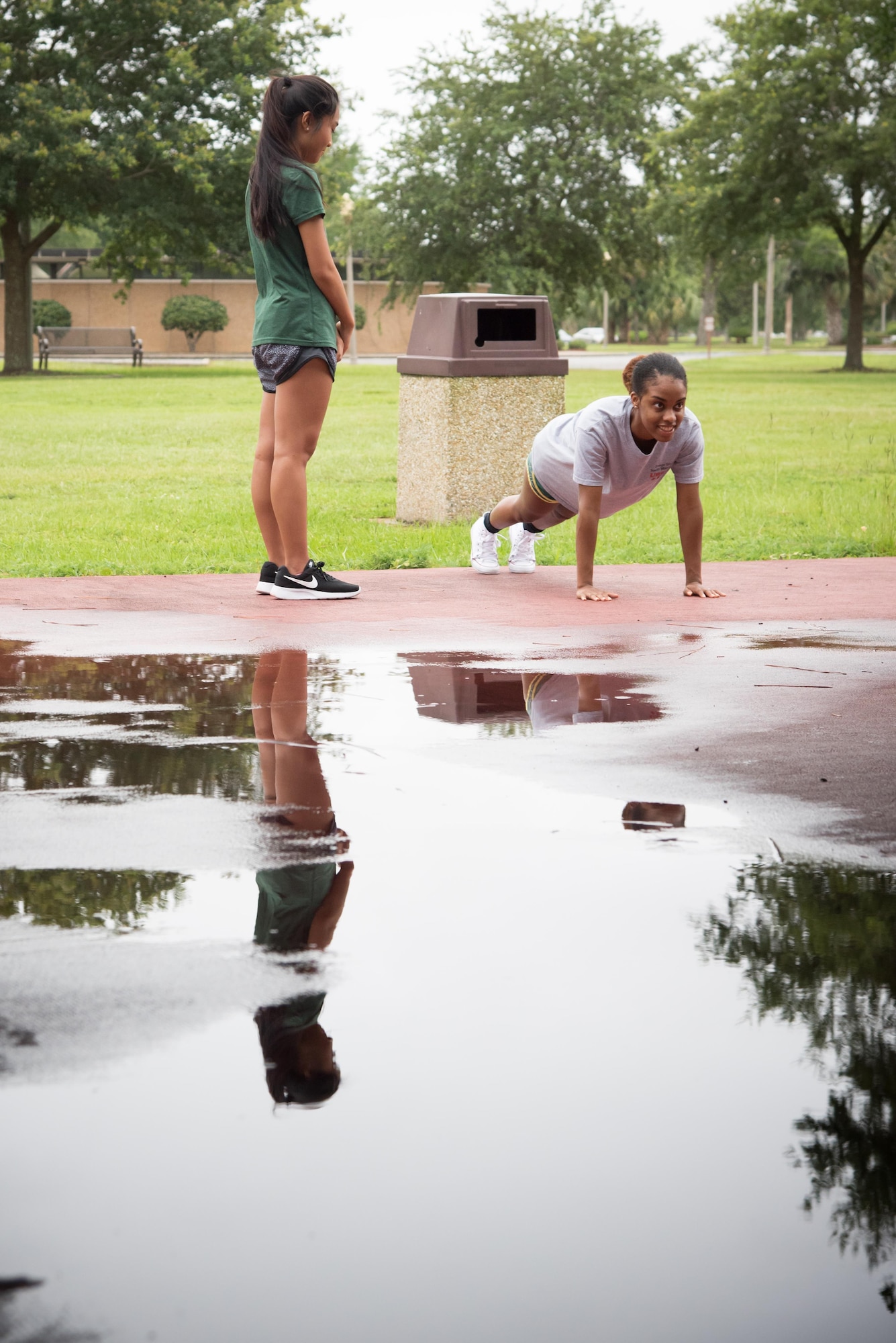 Makalya Averett, 403rd Developmental and Training Flight trainee pracices pushups during a physical training session June 3, 2017 at Keesler Air Force Base, Mississippi. (U.S. Air Force photo/Staff Sgt. Heather Heiney)