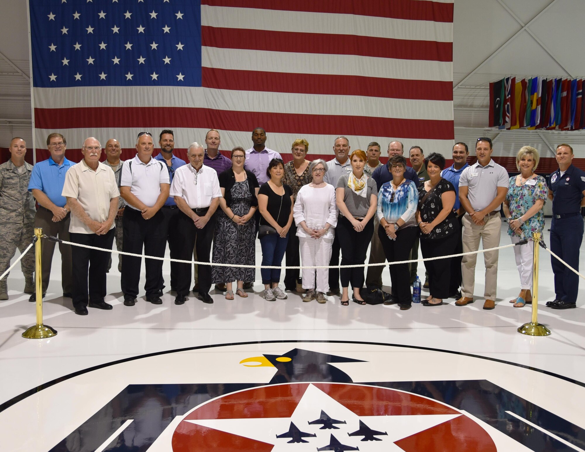 McConnell civic leaders pose for a group photo at the Thunderbirds Hangar, June 21, 2017, at Nellis Air Force Base, Nev. Twenty civic leaders from Wichita and its surrounding communities boarded a McConnell KC-135 Stratotanker for Nellis to get an up-close look at the “Home of the Fighter Pilot,” and the 99th Air Base Wing.  (U.S. Air Force photo by Tech. Sgt. Abigail Klein)