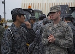 U.S. Air Force 1st Lt. Ross King, right, 35th Civil Engineer Squadron project management officer in charge, speaks with Japan Air Self-Defense Force Capt. Ken’ichiro Oda, left, 3rd Air Wing civil engineer OIC, during a bilateral exchange event at Misawa Air Base, Japan, June 21, 2017. Having bilateral exchanges provides opportunities for Airmen to develop work and personal relationship with the host nation. 