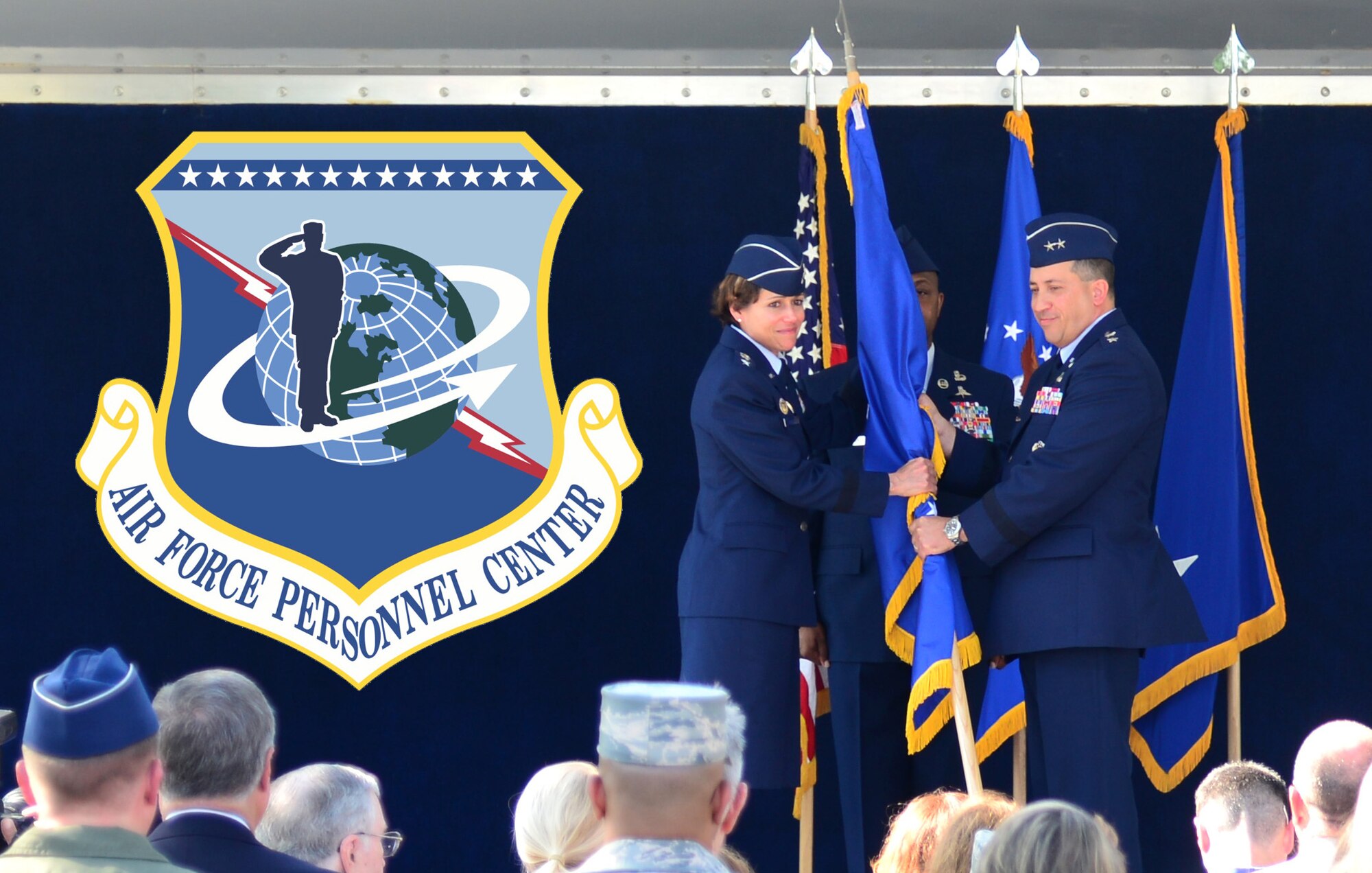 U.S. Air Force Lt. Gen. Gina Grosso, deputy chief of staff for manpower, personnel and services, presents the headquarters guidon to Maj. Gen. Brian Kelly, incoming Air Force Personnel Center commander, during a change of command ceremony June 23, 2017 at Joint Base San Antonio-Randolph, Texas. Kelly assumed this role as Maj. Gen. Peggy Poore formally relinquished command after several years of dedicated service. (U.S. Air Force photo by Staff Sgt. Alexx Pons)