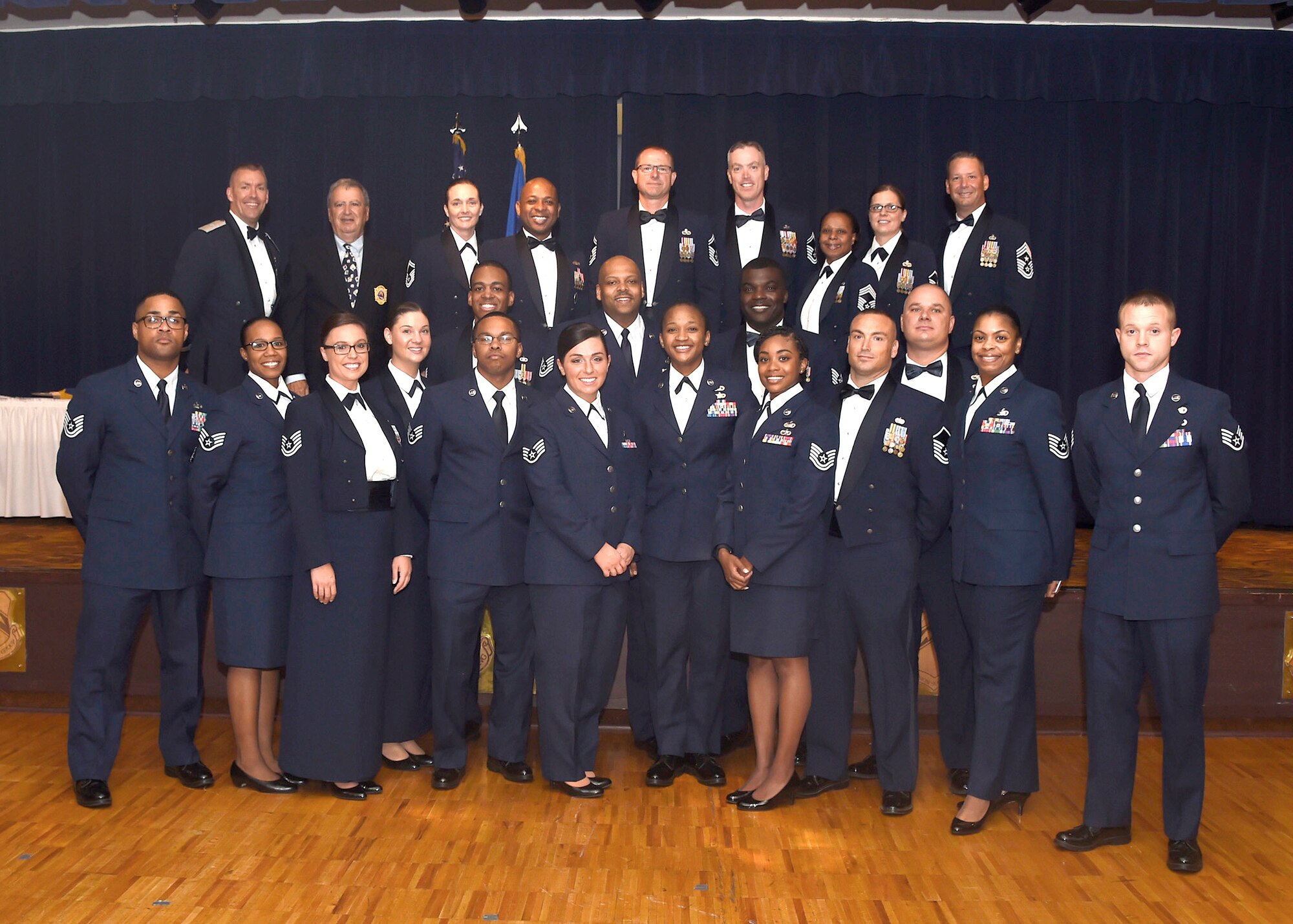 Graduates and instructors of the Airpower Leadership Academy Class 17-A pause for a group photo during graduation June 21, 2017 at Luke Air Force Base, Ariz. ALA is a 20-week program for technical and staff sergeants focused on leadership development through: relationships, expectations, academics, character and health. (U.S. Air Force photo by Senior Airman Devante Williams)  