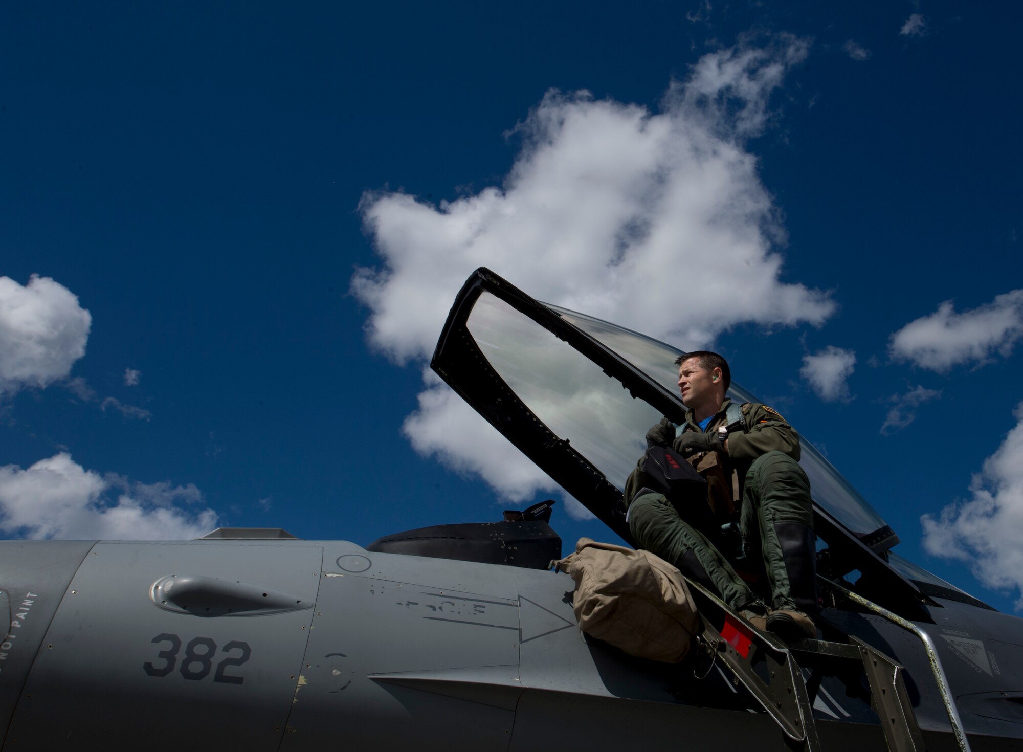 U.S. Air Force fighter pilot, Lt. Col. Ryan Ley, assigned to the 14th Fighter Squadron prepares for a flight on an F-16 during RED FLAG-Alaska 17-2 June 16, 2017, at Eielson Air Force Base, Alaska. RED FLAG-Alaska provides an optimal training environment in the Indo-Asia Pacific Region and focuses on improving ground, space, and cyberspace combat readiness and interoperability for U.S. and international forces.  (U.S. Air Force photo by Airman 1st Class Haley D. Phillips)