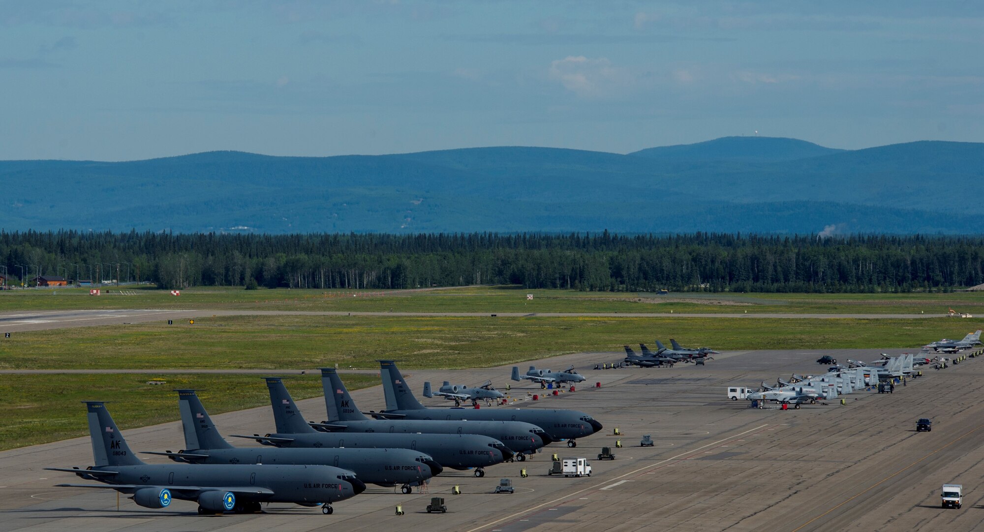 U.S. Air Force aircraft sit on the flight line during RED FLAG-Alaska 17-2 June 19, 2017, at Eielson Air Force Base, Alaska. RED FLAG-Alaska provides an optimal training environment in the Indo-Asia Pacific Region and focuses on improving ground, space, and cyberspace combat readiness and interoperability for U.S. and international forces. (US Air Force photo by Airman 1st Class Sean Carnes) 