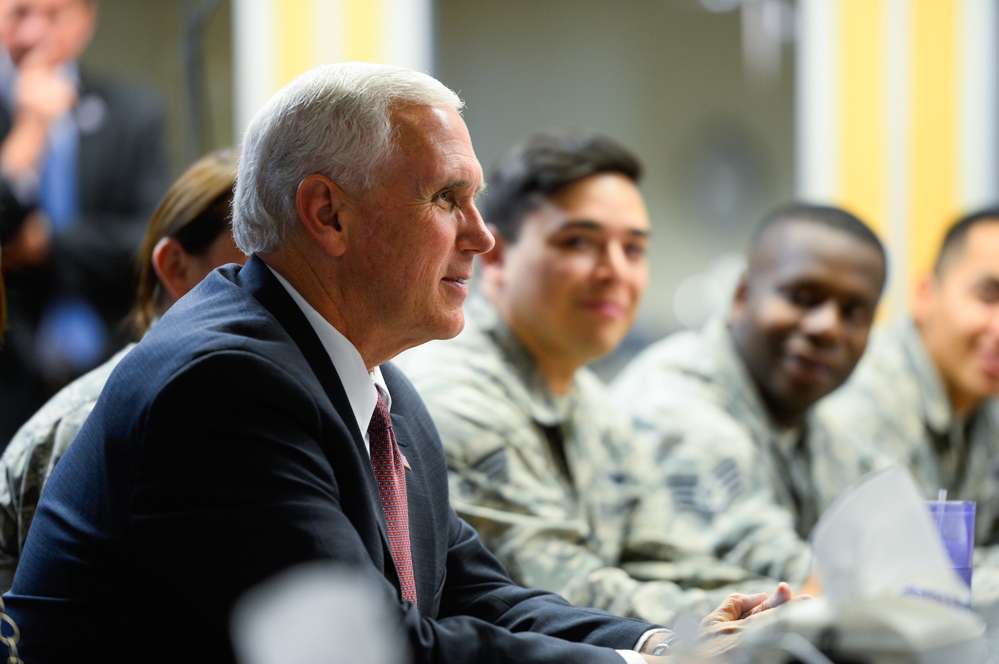 Vice President Mike Pence visited with airmen during a luncheon at Schriever Air Force Base, Colo., Friday June 22, 2017. During his visit, Pence spoke with base personnel on important topics such as the the Air Force Space command budget and thanked the member present for their service and dedication to duty. (U.S. Air Force photo/Christopher DeWitt)