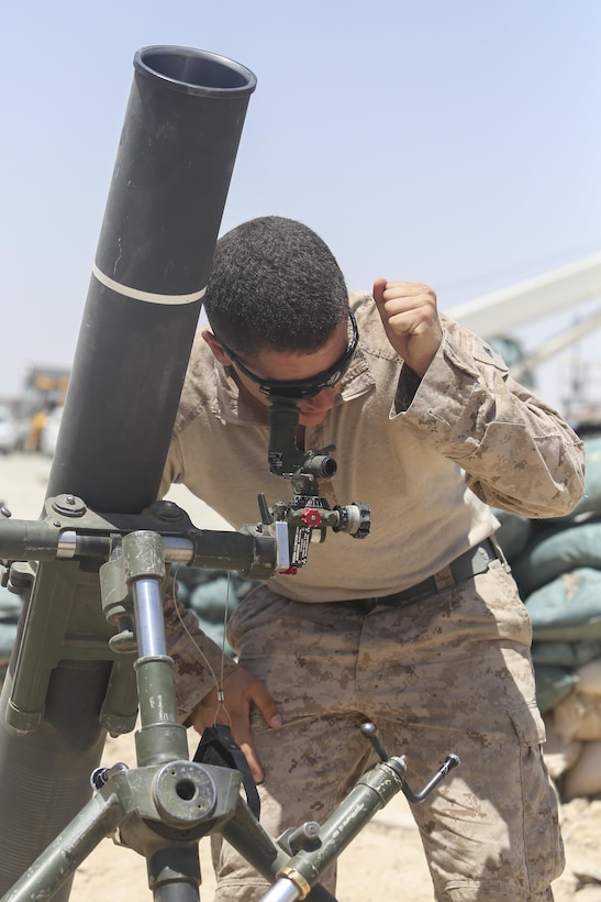 A Marine with Task Force Southwest refers an M64A1 sight and realigns aiming posts in preparation for a 120mm mortar registration mission at Camp Shorab, Afghanistan, June 23, 2017. Several Marines with the Task Force’s mortar section conducted registration and adjust fire missions in order to register 120mm mortar systems and sustain mortar gunnery skills. (U.S. Marine Corps photo by Sgt. Lucas Hopkins)