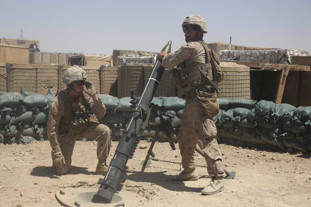 A Marine with Task Force Southwest inserts a round into a 120mm mortar during a registration mission at Camp Shorab, Afghanistan, June 23, 2017. The event allowed for the proper registration of mortar systems, improving base security, while also sustaining the Marines’ mortar gunnery skills. (U.S. Marine Corps photo by Sgt. Lucas Hopkins)