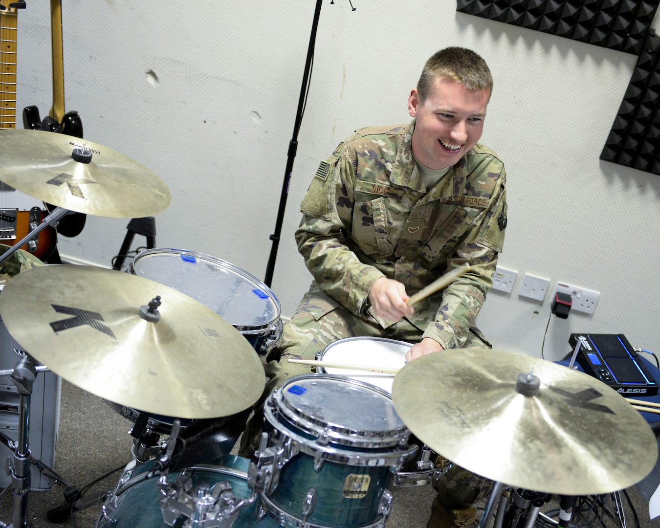 U.S. Air Force Airman 1st Class Joshua Dick, drummer assigned to the Air Force Central Command Band, practices drums in preparation for a concert at Al Udeid, Air Force Base, Qatar, May 25, 2017. The AFCENT Band, stationed at Al Udeid, travels throughout the Central Command Area of Responsibility in support of building partnerships, boosting morale, and providing diplomacy and outreach to host nation communities. (U.S. Air Force photo by Tech. Sgt. Bradly A. Schneider/Released)
