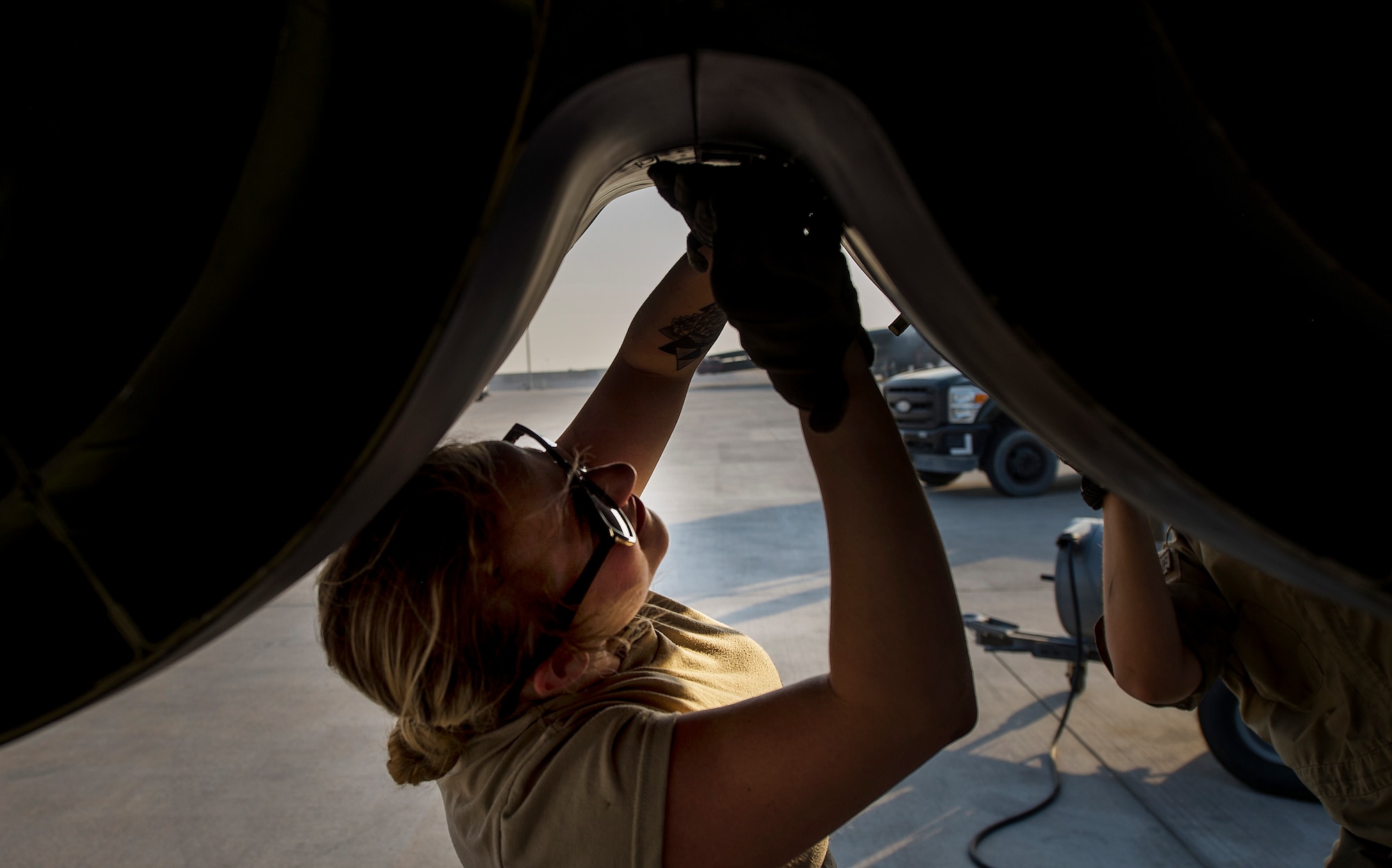 A maintainer, assigned the 23rd Expeditionary Aircraft Maintenance Unit, performs maintenance on a B-52 Stratofortress at an undisclosed location in Southwest Asia, June 15, 2017. The 23rd EAMU provided the 400th consecutive sortie without a maintenance cancellation on the day the 23rd Expeditionary Bomb Squadron celebrated the 100th anniversary of the unit. (U.S. Air Force photo by Staff Sgt. Trevor T. McBride) 