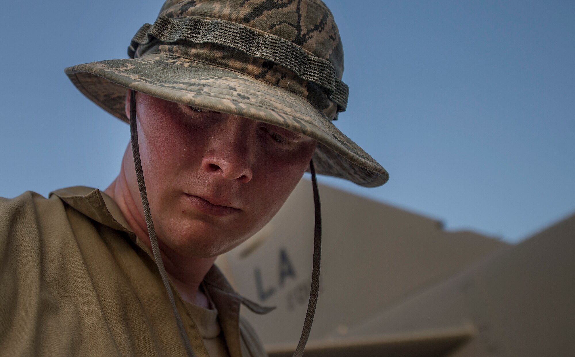 A munitions technician, assigned to the 23rd Expeditionary Aircraft Maintenance Unit, prepares to load munitions on a B-52 Stratofortress assigned to the 23rd Expeditionary Bomb Squadron at an undisclosed location in Southwest Asia, June 15, 2017. The 23rd EAMU provided the 400th consecutive sortie without a maintenance cancellation on the day the 23rd EBS celebrated the 100th anniversary of the unit. (U.S. Air Force photo by Staff Sgt. Trevor T. McBride) 
