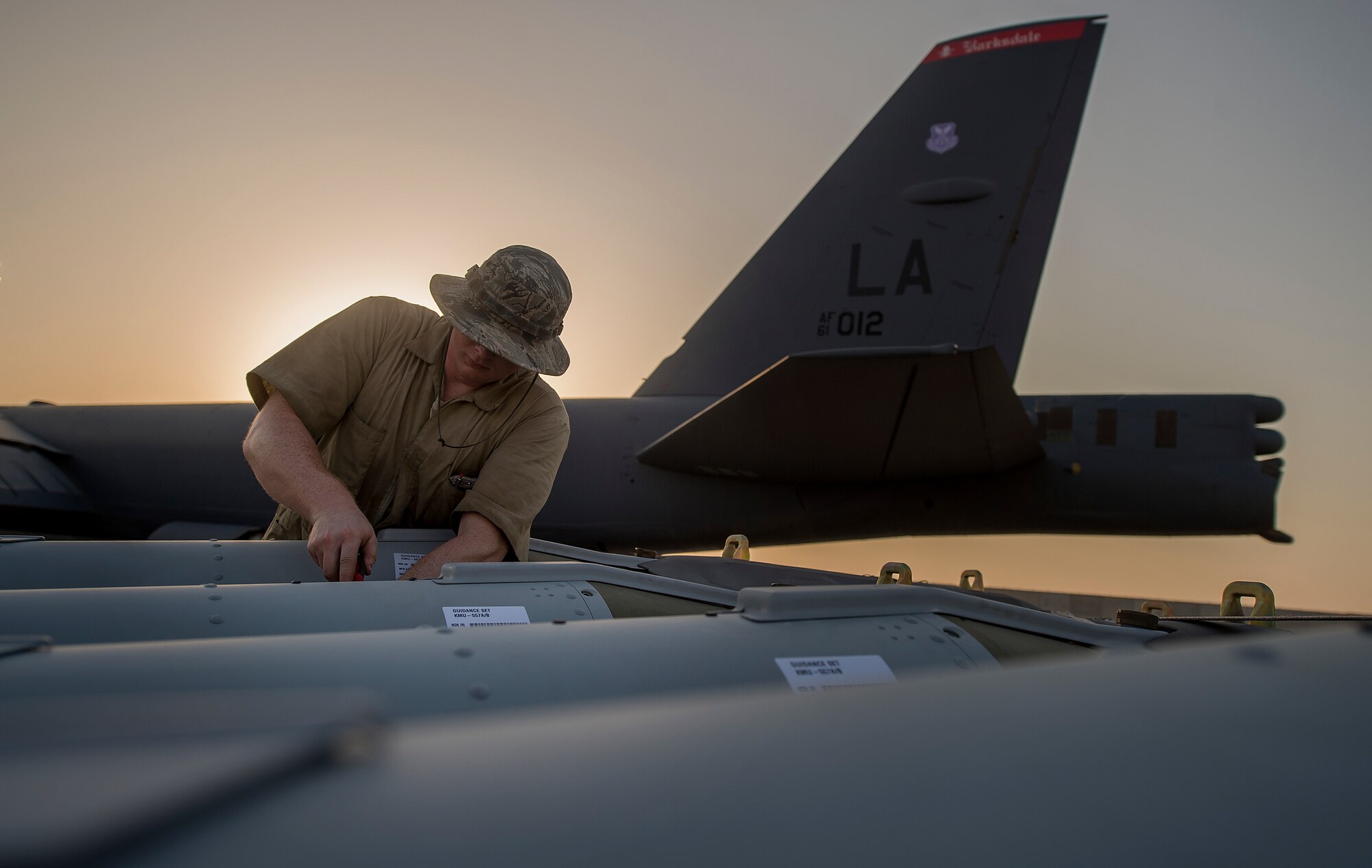 A munitions technician, assigned to the 23rd Expeditionary Aircraft Maintenance Unit, prepares to load munitions on a B-52 Stratofortress assigned to the 23rd Expeditionary Bomb Squadron at an undisclosed location in Southwest Asia, June 15, 2017. The 23rd EAMU provided the 400th consecutive sortie without a maintenance cancellation on the day the 23rd EBS celebrated the 100th anniversary of the unit. (U.S. Air Force photo by Staff Sgt. Trevor T. McBride) 
