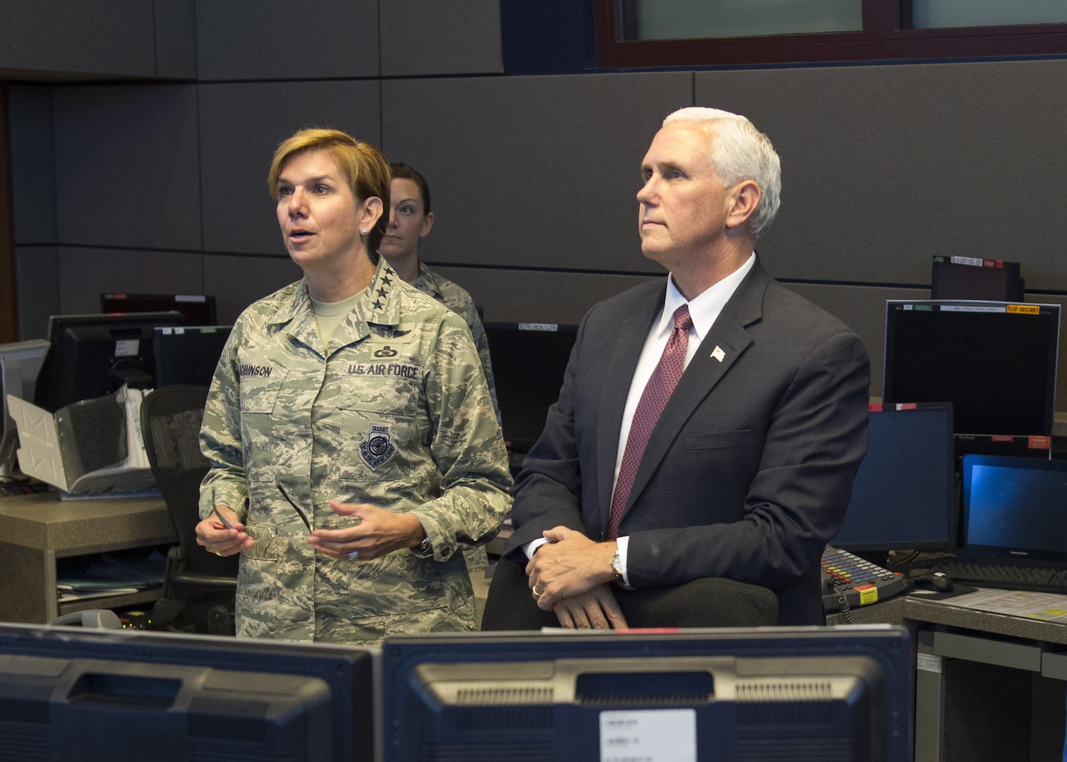 Vice President Michael Pence receives a mission briefing from U.S. Air Force General Lori J. Robinson, the commander of the North American Aerospace Defense Command and U.S. Northern Command inside the Alternate Command Center at Cheyenne Mountain Air Force Station, June 23, 2017. The Vice President was accompanied by the Secretary of the Air Force, the Honorable Heather Wilson, and received briefings to better familiarize them with the unique mission that NORAD and USNORTHCOM have in defense of Canada and the United States.  (DoD Photo By: N&NC Public Affairs/Released)