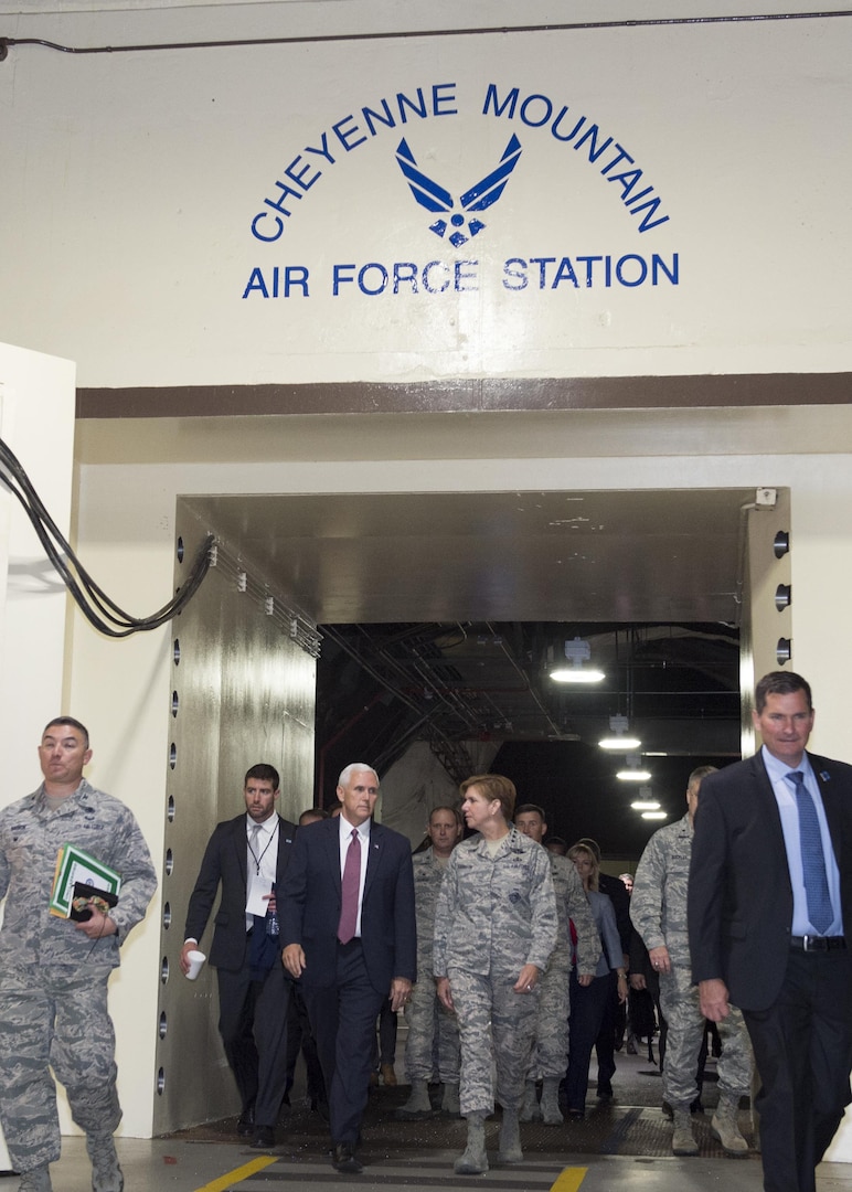 Vice President Michael Pence and U.S. Air Force General Lori J. Robinson, the commander of the North American Aerospace Defense Command and U.S. Northern Command exit the blast doors inside Cheyenne Mountain Air Force Station, June 23, 2017. The Vice President was accompanied by the Secretary of the Air Force, the Honorable Heather Wilson, and received briefings to better familiarize them with the unique mission that NORAD and USNORTHCOM have in defense of Canada and the United States. (DoD Photo By: N&NC Public Affairs/Released)