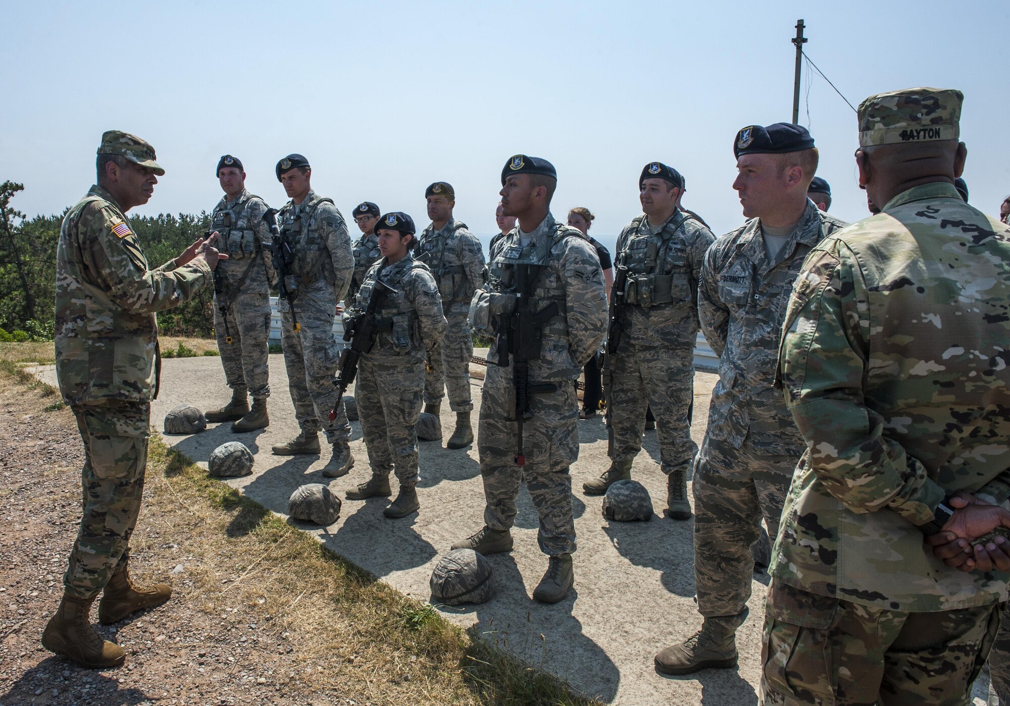 U.S. Army Gen. Vincent K. Brooks, United States Forces Korea commander, speaks with Airmen assigned to the 8th Security Forces Squadron at Kunsan Air Base, Republic of Korea, June 22, 2017. The 8th SFS showcased their role in the first priority of the Wolf Pack’s mission, “Defend the Base.” (U.S. Air Force photo by Senior Airman Colville McFee/Released)