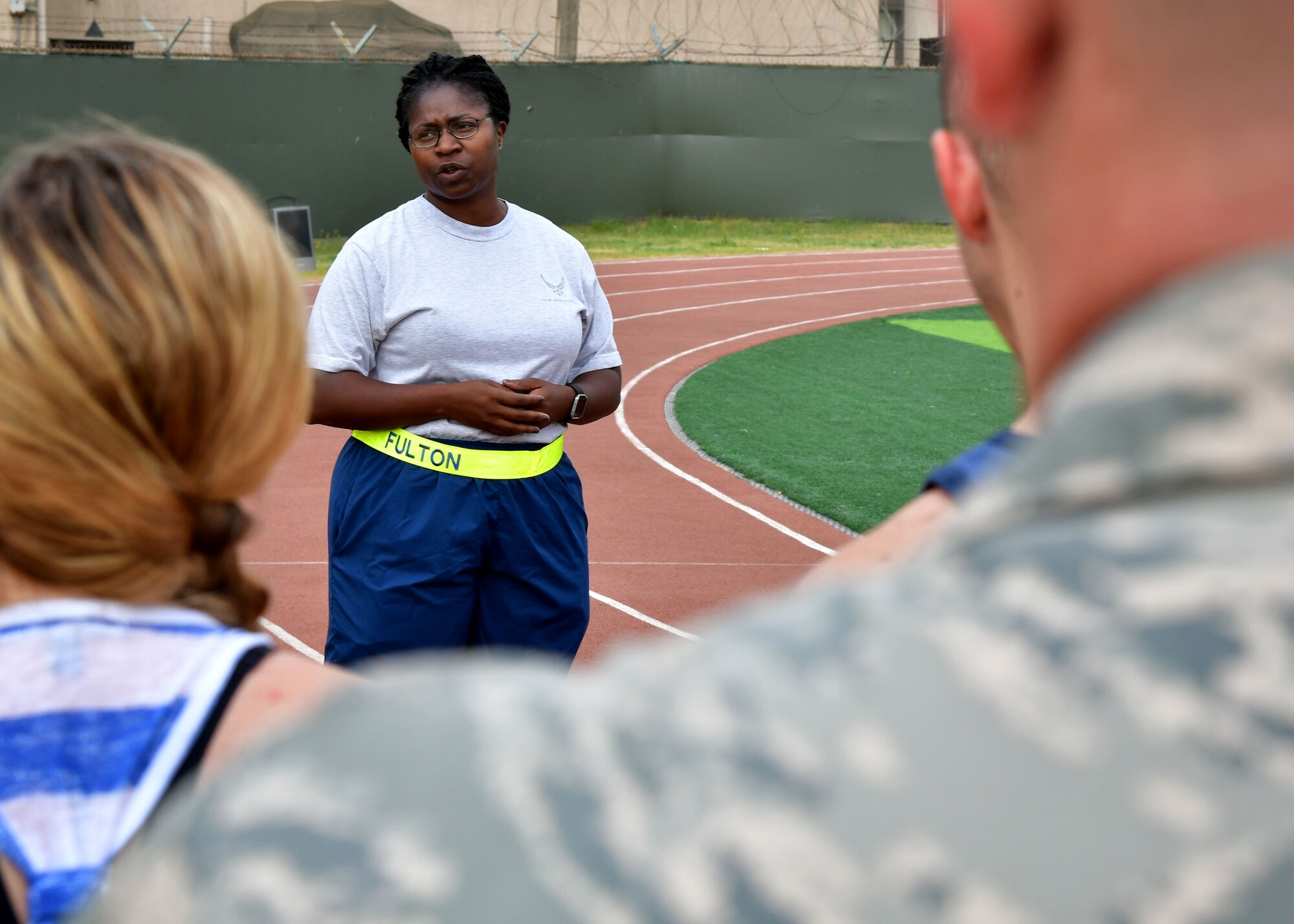 U.S. Air Force Lt. Col. Breanna Fulton, 731st Air Mobility Squadron commander, speaks about U.S. Air Force Staff Sgt. Cierra Rogers prior to a fitness challenge June 23, 2017 at Osan Air Base, Republic of Korea. The 731st AMS along with the Osan Top Three Heritage Committee and the 51st Force Support Squadron Fitness Staff unveiled a memorial and hosted the “Rogers Fit Workout” challenge in honor of Rogers, who has passed away May 20, 2016, due to injuries she sustained from helping a family escape a burning apartment building. (U.S. Air Force photo by Senior Airman Franklin R. Ramos/Released)