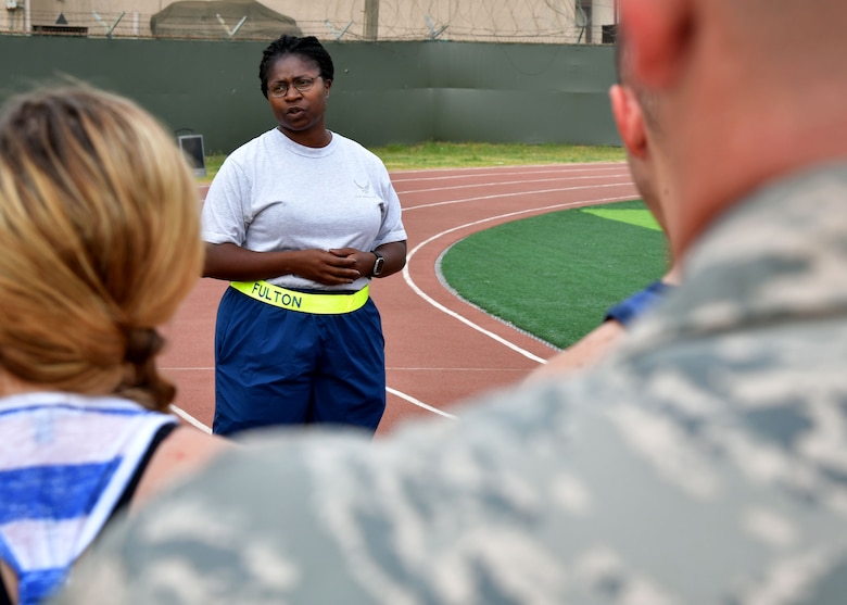 U.S. Air Force Lt. Col. Breanna Fulton, 731st Air Mobility Squadron commander, speaks about U.S. Air Force Staff Sgt. Cierra Rogers prior to a fitness challenge June 23, 2017 at Osan Air Base, Republic of Korea. The 731st AMS along with the Osan Top Three Heritage Committee and the 51st Force Support Squadron Fitness Staff unveiled a memorial and hosted the “Rogers Fit Workout” challenge in honor of Rogers, who has passed away May 20, 2016, due to injuries she sustained from helping a family escape a burning apartment building. (U.S. Air Force photo by Senior Airman Franklin R. Ramos/Released)
