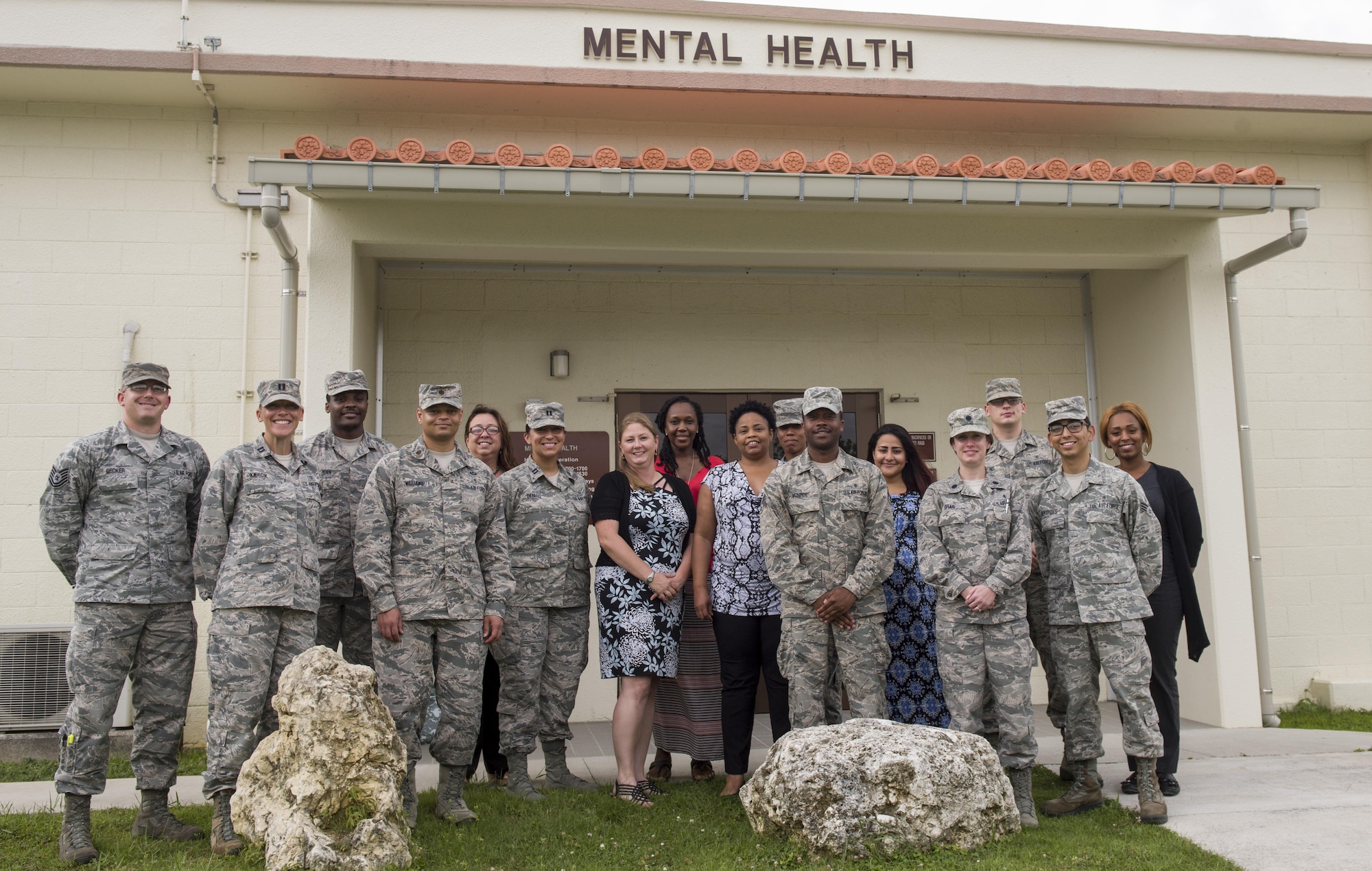 Mental health providers from the 18th Medical Operations Squadron stand for a group photo in front of the Kadena Mental Health Clinic June 26, 2017, at Kadena Air Base, Japan. The Kadena Mental Health Clinic serves the mental health needs of more than 16,000 joint service beneficiaries, including U.S. military service members, veterans, and their families. (U.S. Air Force photo by Senior Airman Omari Bernard)