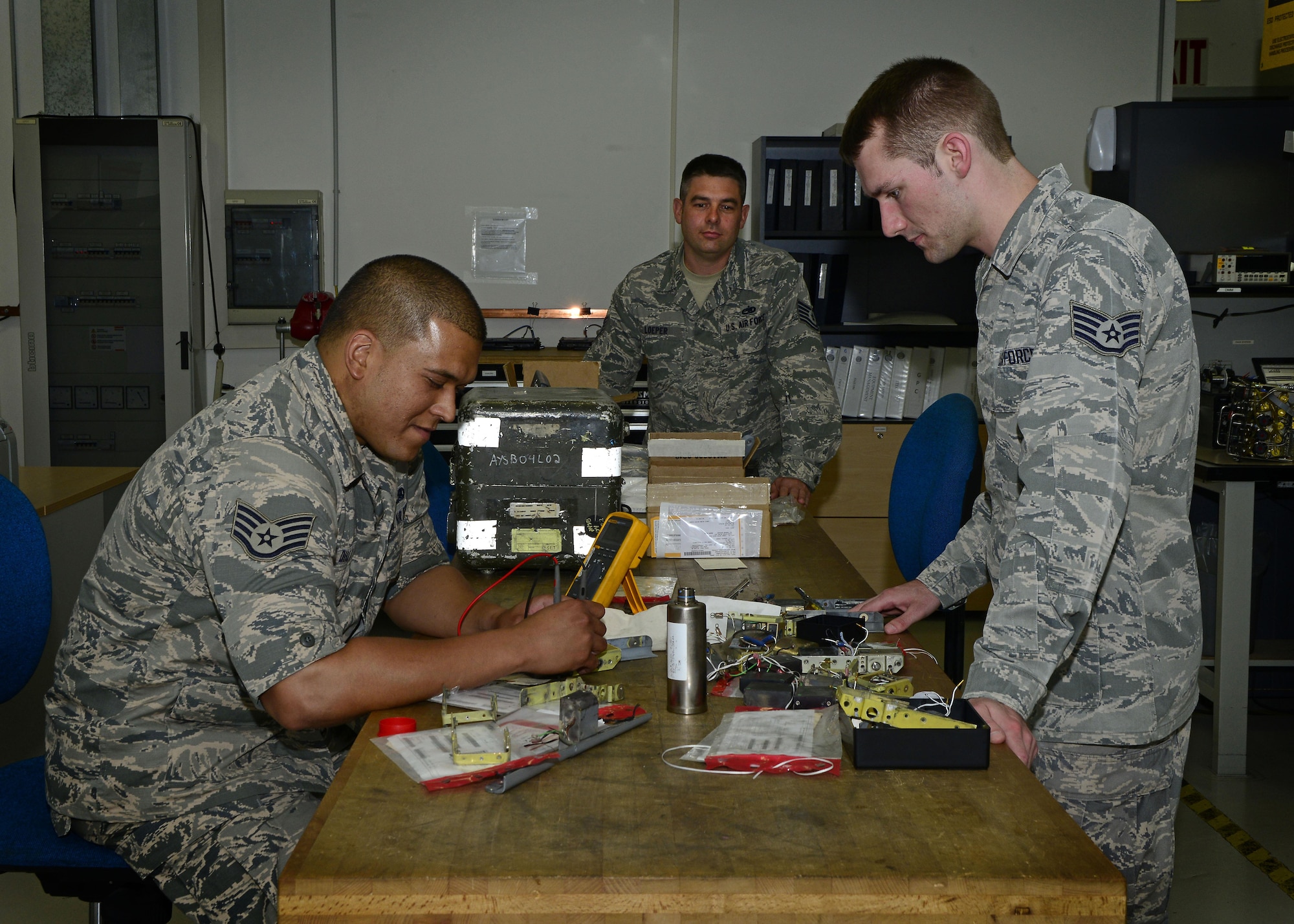 The team at the 31st Maintenance Group Air Force Repair Enhancement Program assess broken equipment to determine its repairability, June 14, 2017 at Aviano Air Base, Italy. AFREP has repaired 125 items so far during the 2017 fiscal year. (U.S. Air Force photo by Airman 1st Class Ryan Brooks)