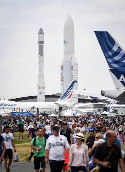 Crowds make their way to the aerial demonstration viewing area at Le Bourget Airport, France, during the Paris Air Show, June 23, 2017. The Paris Air Show offers the U.S. a unique opportunity to showcase their leadership in aerospace technology to an international audience. By participating, the U.S. hopes to promote standardization and interoperability of equipment with their NATO allies and international partners. This year marks the 52nd Paris Air Show and the event features more than 100 aircraft from around the world. (U.S. Air Force photo/ Tech. Sgt. Ryan Crane)