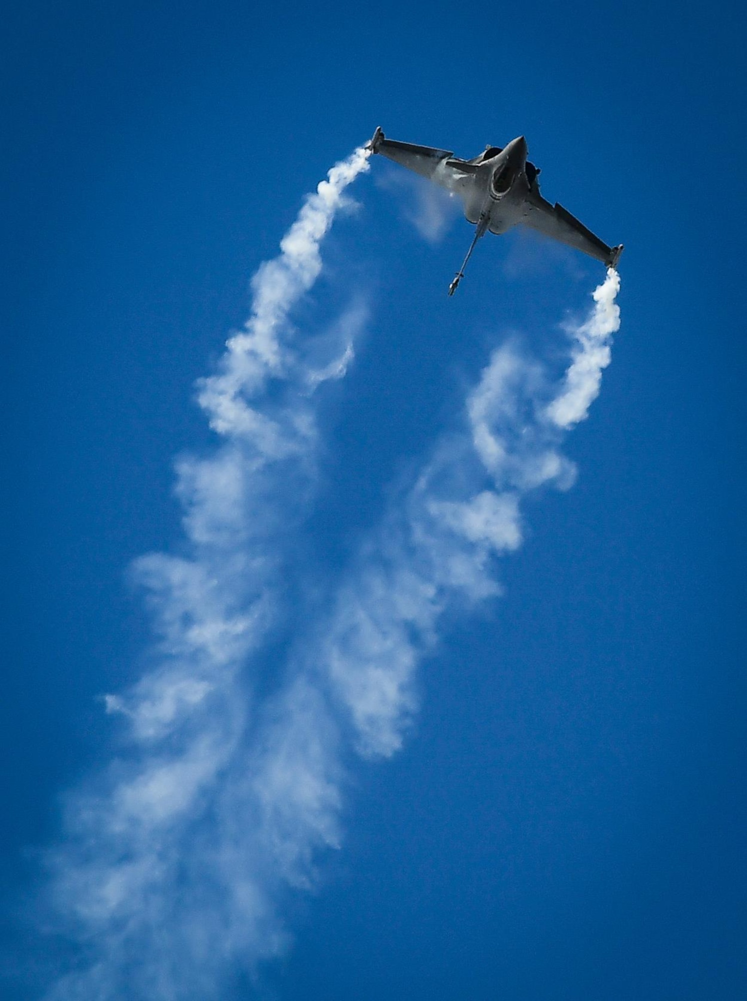 A French Dassault Rafale performs for a crowd of nearly 100,000 people at Le Bourget Airport, France, during the Paris Air Show, June 23, 2017. The Paris Air Show offers the U.S. a unique opportunity to showcase their leadership in aerospace technology to an international audience. By participating, the U.S. hopes to promote standardization and interoperability of equipment with their NATO allies and international partners. This year marks the 52nd Paris Air Show and the event features more than 100 aircraft from around the world. (U.S. Air Force photo/ Tech. Sgt. Ryan Crane)