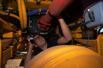 Senior Airman Dalton Dritz, 5th Logistics Readiness Squadron vehicle maintainer, inspects a snow blower at Minot Air Force Base, N.D., June 19, 2017. The 5th LRS Aimen in the special purpose shop support both the 91st Missile Wing and 5th Bomb Wing vehicle fleets. (U.S. Air Force photo by Airman 1st Class Dillon J. Audit)