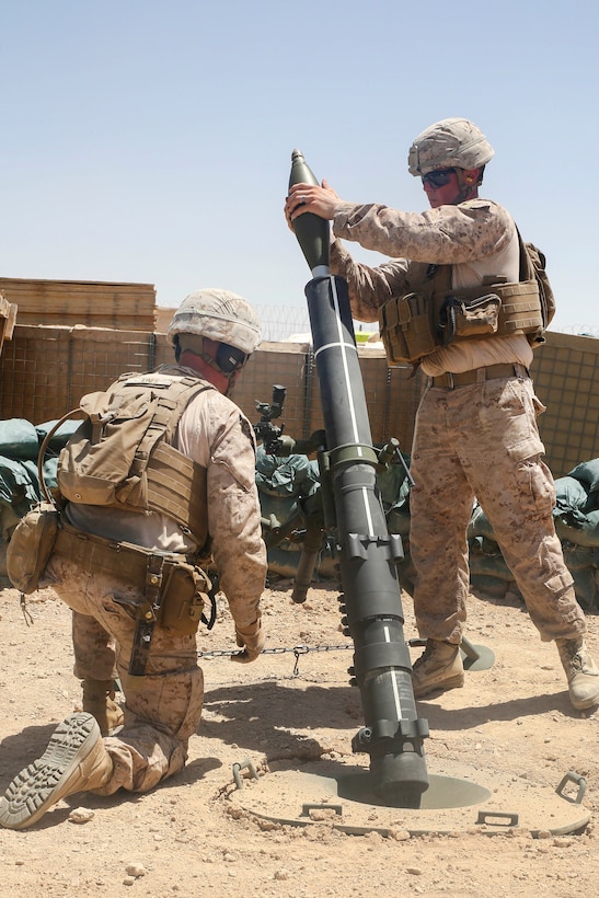 A Marine loads a round into a 120 mm mortar system at Camp Shorab, Afghanistan, June 23, 2017. Marine Corps photo by Sgt. Lucas Hopkins