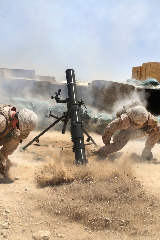 Marines fire a 120 mm mortar at Camp Shorab, Afghanistan, June 23, 2017. Marine Corps photo by Sgt. Lucas Hopkins
