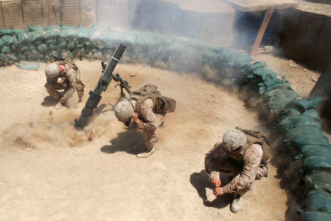 Marines fire a 120 mm mortar system while conducting a mission at Camp Shorab, Afghanistan, June 23, 2017. Marine Corps photo by Sgt. Lucas Hopkins