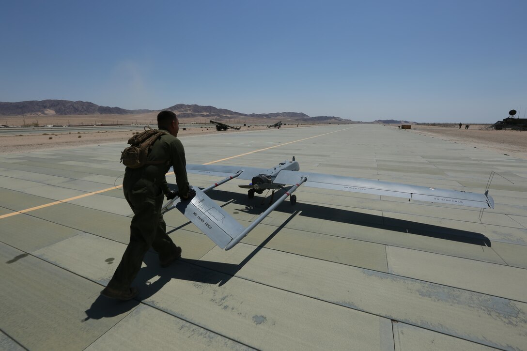 Lance Cpl. Miguel Salazar, an unmanned aerial vehicle technician with Marine Unmanned Aerial Vehicle Squadron 4, Marine Aircraft Group 41, 4th Marine Aircraft Wing, Marine Forces Reserve, returns an RQ-7 Shadow to the VMU-4 hanger at Camp Wilson, Marine Air Ground Combat Center, Twentynine Palms, California, June 22, 2017. VMU-4 provided aerial reconnaissance in support of the 2nd Battalion, 25th Marine Regiment, 4th Marine Division, MARFORRES final battalion exercise of ITX 4-17.  (U.S. Marine Corps photo by Lance Cpl. Stanley Moy)