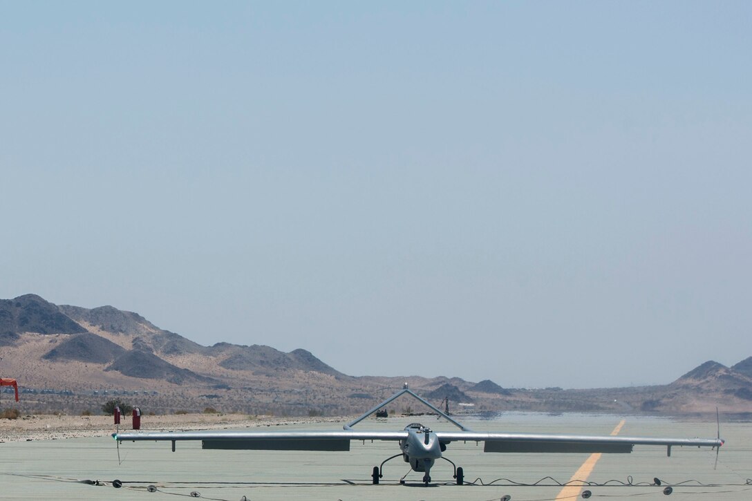 An RQ-7B Shadow belonging to Marine Unmanned Aerial Squadron 4, Marine Aircraft Group 41, 4th Marine Aircraft Wing, Marine Forces Reserve, lands on an airstrip at Camp Wilson, Marine Air Ground Combat Center Twentynine Palms, California, June 22, 2017, after a reconnaissance mission during Integrated Training Exercise 4-17. VMU-4 provided aerial reconnaissance in support of the 2nd Battalion, 25th Marine Regiment, 4th Marine Division, MARFORRES final battalion exercise of ITX 4-17. (U.S. Marine Corps photo by Lance Cpl. Imari J. Dubose)