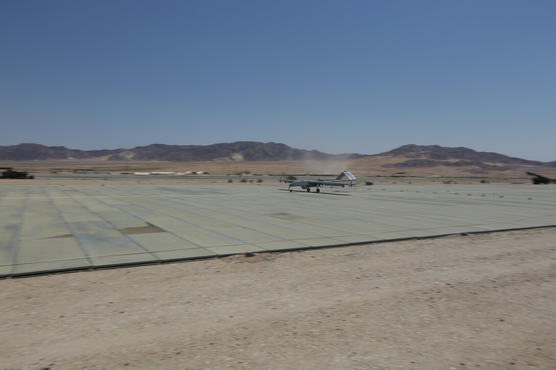 An RQ-7 Shadow with Marine Unmanned Aerial Vehicle Squadron 4, Marie Aircraft Group 41, 4th Marine Aircraft Wing, Marine Forces Reserve, lands after performing a reconnaissance mission at Camp Wilson, Marine Air Ground Combat Center, Twentynine Palms, California, June 22, 2017. VMU-4 provided aerial reconnaissance in support of the 2nd Battalion, 25th Marine Regiment, 4th Marine Division, MARFORRES final battalion exercise of ITX 4-17.  (U.S. Marine Corps photo by Lance Cpl. Stanley Moy)