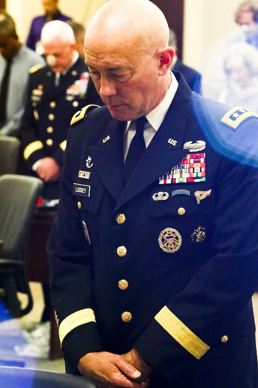 Lt. Gen. Charles D. Luckey, Chief of Army Reserve and Commanding General, United States Army Reserve, prays during Maj. Gen. David Conboy’s retirement ceremony at Fort Bragg, NC, June 23, 2017. The  CG stated that Conboy was instrumental in providing him with a candid and complete view of where the Army Reserve currently is and where it needs to go. (U.S. Army photo by Staff Sgt. Felix R. Fimbres)
