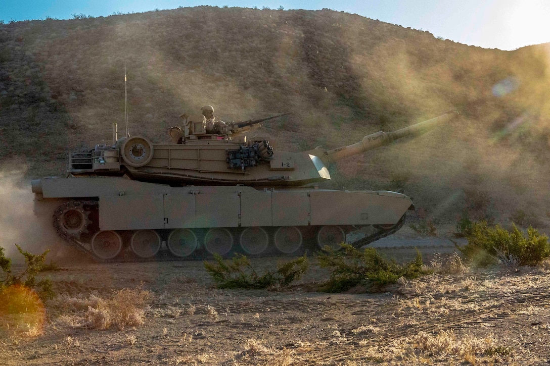 Marines maneuver an Abrams M1A1 tank during Integrated Training Exercise 4-17 at Twentynine Palms, Calif., June 21, 2017. The Marines are assigned to 2nd Battalion, 25th Marine Regiment, 4th Marine Division, Marine Forces Reserve. Marine Corps photo by Pfc. Melany Vasquez