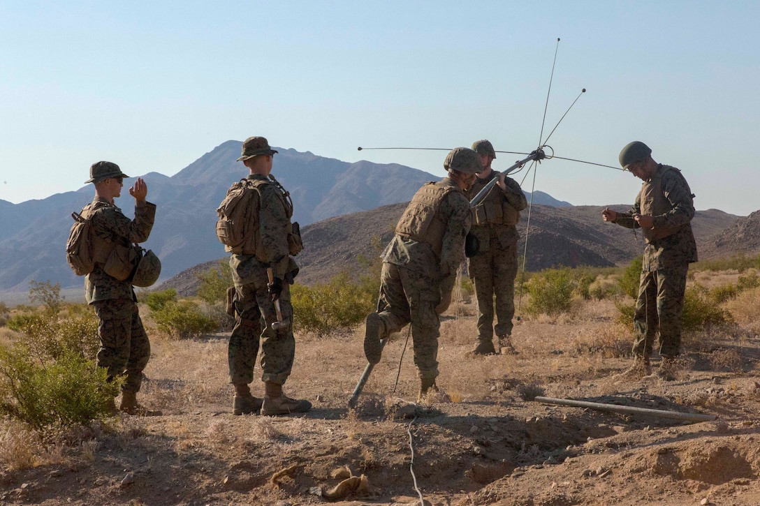 Marines set up radio antennas during Integrated Training Exercise 4-17 at Twentynine Palms, Calif., June 21, 2017. Marine Corps photo by Pfc. Melany Vasquez