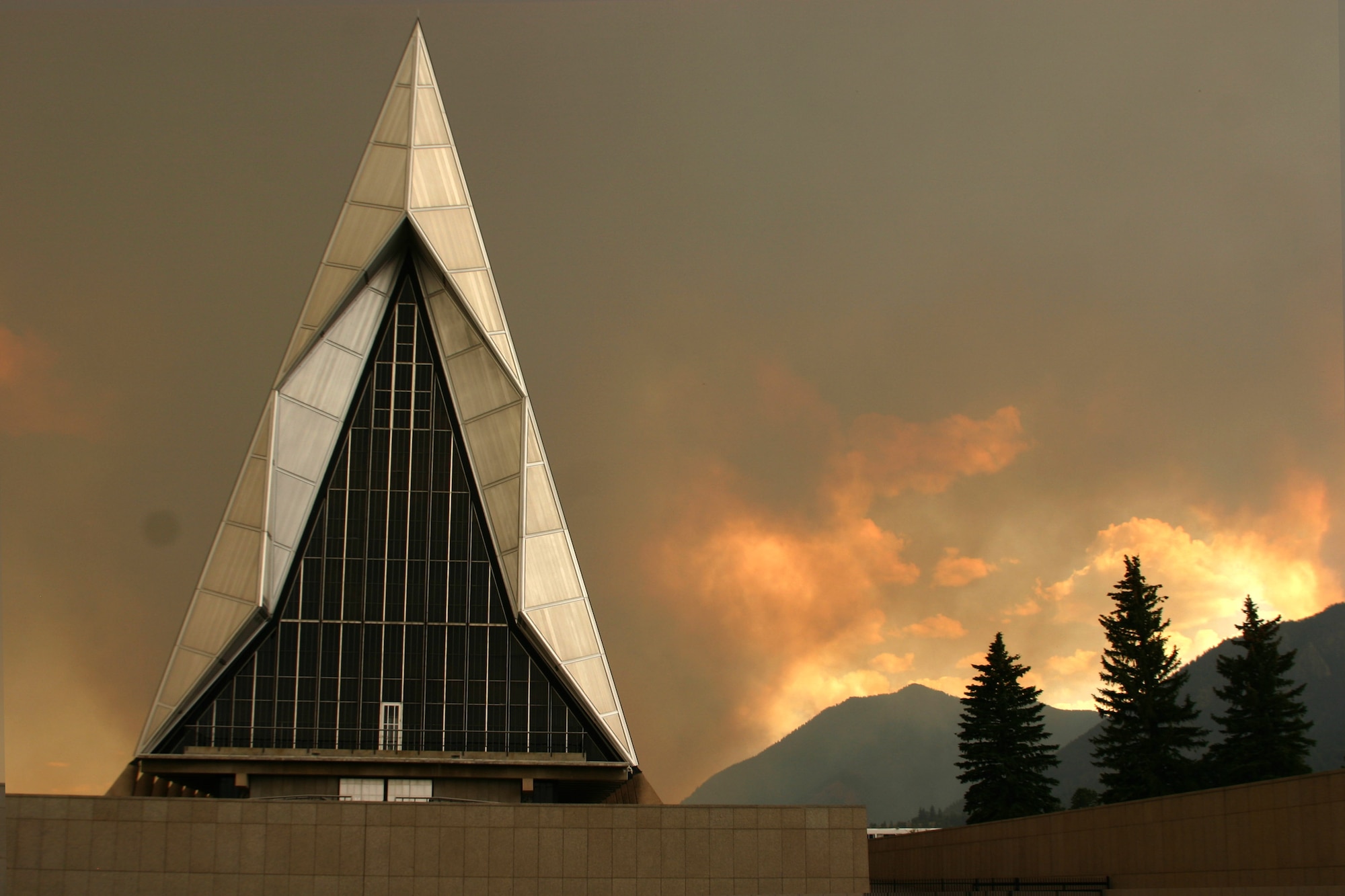 The U.S. Air Force Academy is shrouded in smoke from the flames of the nearby Waldo Canyon fire July 26, 2017. The fire began June 23, 2017 in Waldo Canyon, a popular hiking area near the school. (U.S. Air Force Academy photo) 