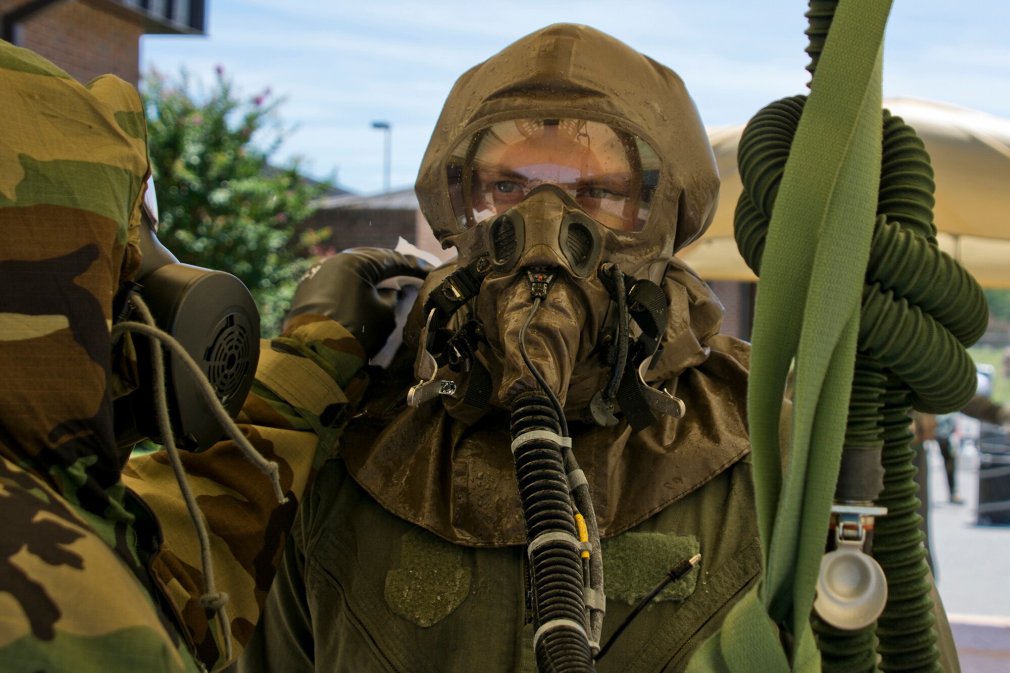 U.S. Air Force Reserve Staff Sgt. Michael Richardson, aircrew flight equipment (AFE) specialist, 913th Operations Support Squadron, uses a towelette to remove simulated contaminants from Staff Sgt. Michael Hopson, loadmaster, 327th Airlift Squadron, during decontamination training for AFE specialist’s June 19, 2017, at Little Rock Air Force Base, Ark. Richardson was one of four AFE Airmen who took part in training to enhance skills needed to protect personnel and equipment so they can work safely and effectively in a contaminated environment. (U.S. Air Force photo by Master Sgt. Jeff Walston/Released)
