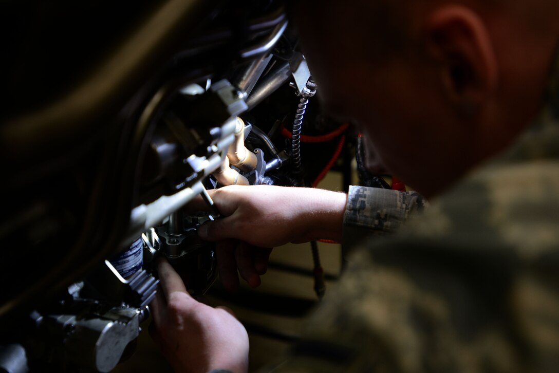 U.S. Air Force Airman Christian Lank, 20th Component Maintenance Squadron aerospace propulsion apprentice, works on removing the accessory drive gearbox of an F-16CM Fighting Falcon during training at the 372nd Training Squadron, Detachment 202 F-16 Field Training Detachment (FTD) at Shaw Air Force Base, S.C., April 25, 2017. The FTD aims to improve upon the existing skills of maintainers, through teaching advanced techniques and troubleshooting procedures. (U.S. Air Force photo by Senior Airman Kelsey Tucker)